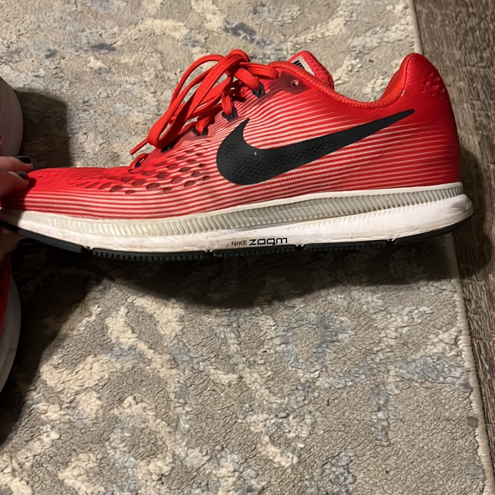 Red Nike shoes.